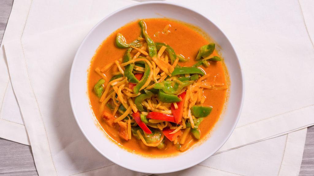 Gang Dang · Gluten-free and spicy dish. Red curry, coconut milk with bamboo shoots, mushrooms and green peppers.