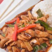 Pad Prik · Green peppers, white onions, green onions, bamboo shoots, and mushrooms stir fried in a brow...