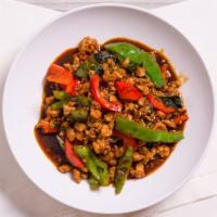 Dinner Pad Kee Mao · Minced chicken, basil leaves and green pepper stir fried a brown sauce. Spicy.