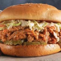 Sweet 'N Smoky Pulled Pork Meal · Pulled pork marinated with our sweet 'n smoky BBQ sauce on a bed of pickles, topped with cre...