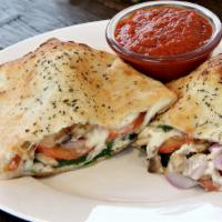Create Your Own Calzone · Choose up to five toppings. The first two toppings are included in the price. Each additiona...