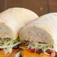 Southwestern Chicken · Made with chicken that is oven roasted, seasoned and sliced, all white breast meat. Topped w...