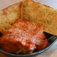 Lasagna · Original davanni's recipe is made with ricotta, mozzarella and Romano, Italian sausage and r...