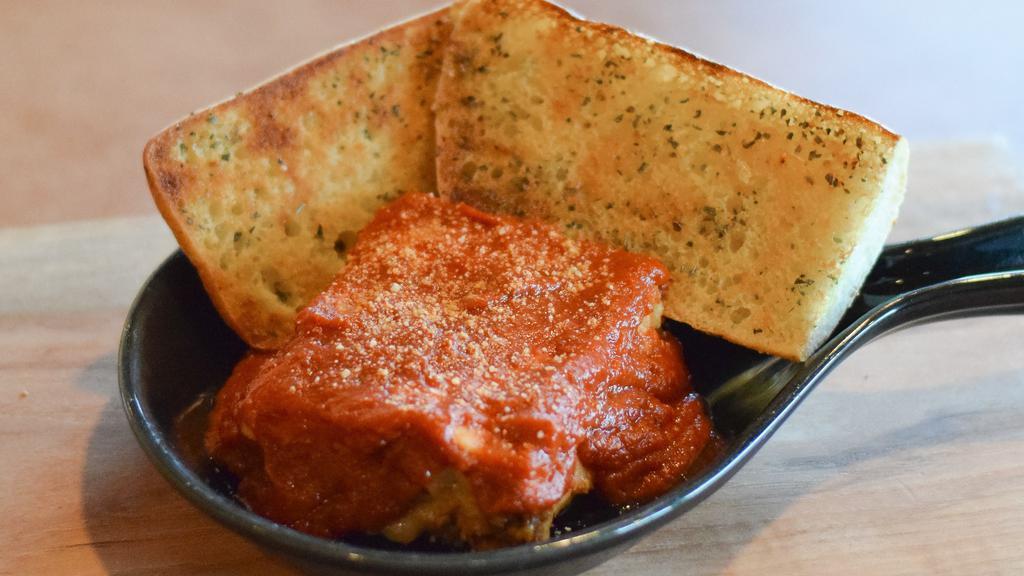 Lasagna · Original davanni's recipe is made with ricotta, mozzarella and Romano, Italian sausage and red sauce; handmade at our shop. Served with ciabatta toast.