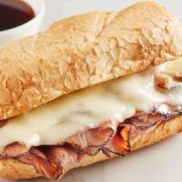 French Dip · Black Angus roast beef and swiss on a baguette, served au jus.