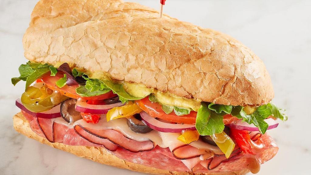 The Italian  · Black Forest ham, salami, provolone, house-roasted multicolored peppers, spring mix, tomato, red onion, black olives, Olive Oil & Balsamic Vinaigrette and spicy brown mustard on baguette.