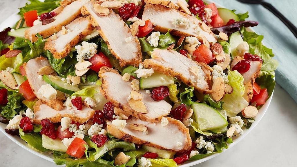 Savannah Chopped Salad · Grilled chicken, dried cranberries, Gorgonzola, honey roasted almonds, tomato and cucumber on mixed greens. Try it with Sherry Shallot dressing.
