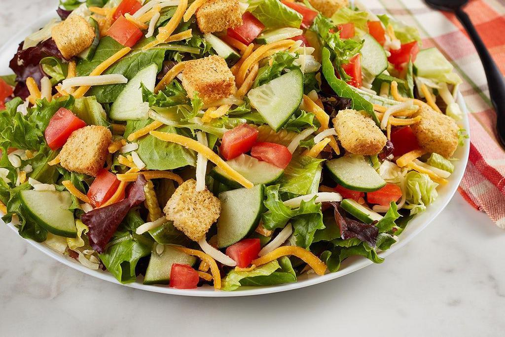 Garden Salad · Cheddar-jack, tomato, cucumber and croutons on mixed greens.