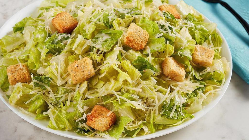 Caesar Salad · Parmesan, croutons and Caesar dressing on romaine lettuce.