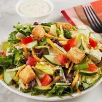 Side Garden Salad · A light bite made with a bed of lettuce, tomatoes, cucumbers, cheddar-jack cheese and your c...
