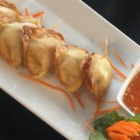 Crab Rangoon · Crab meat, cream cheese, and onions in a wonton wrap.