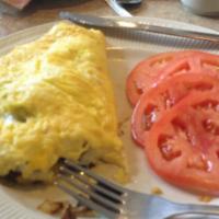 Western Omelette · Ham, american cheese, onions and green peppers.