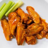 30 Hot Wings · Served with celery and blue cheese or ranch dressing.
