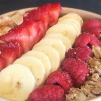 Strawberry Banana Bowl · Strawberry, banana, dates and hemp milk smoothie bowl. Topped with sliced strawberry, banana...