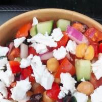 Mediterranean Chickpea Salad · Chickpeas, cucumber, red bell pepper, red onion, kalamata olives, topped with feta cheese.