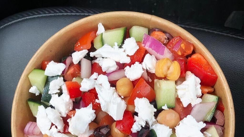 Mediterranean Chickpea Salad · Chickpeas, cucumber, red bell pepper, red onion, kalamata olives, topped with feta cheese.