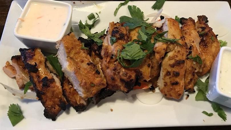 Chicken Tikka Kababs · Chicken tikka kababs marinated with spices.