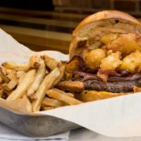 Cheese Curd Burger · Grilled Angus steak burger topped with battered white cheddar cheese curds, thick-cut bacon ...