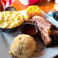 Smoked Beef Brisket · Half a pound of 14 hours oak-smoked beef brisket comes with mashed potatoes and choice of on...