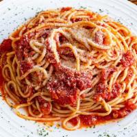 Carmela'S Spaghetti Aglio Olio · Spaghetti in a garlic, oil, tomato sauce.  Served with salad and a roll.