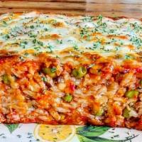 Nonna'S Baked Rice · Nonna's age old recipe with meat, cheese, peas and sauce.
Served with a small side salad and...