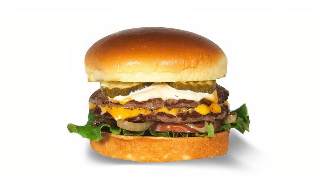 Signature Angus Burger · Double patty burger. 100% Certified Angus Beef, never frozen, no additives, no fillers. Served on toasted brioche bun. American cheese, garlic aioli, lettuce, tomato, pickle, and grilled onion. Choose your included toppings below