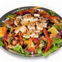 Signature Chopped Salad · Iceberg and green leaf lettuce, tomato, red pepper, black beans, red onion, carrots, bacon, ...