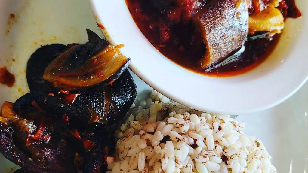 Ofada Rice · with steam sauce & 3 assorted meats