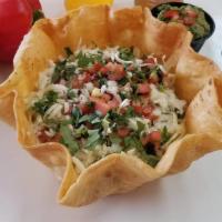 Taco Salad · Taco Salad comes on a Flour Crunchy shell with Mexican rice, beans, your choice of meat and ...