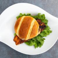 Blackened Catfish Sammich · Catfish seasoned with our homemade blackening seasonings and pan fried to perfection on a to...