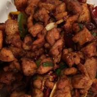 Hot Pepper Chicken · Hot and spicy. Spicy sichuan chili sauce, fried red chili pepper, green onion, chicken.