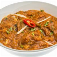 The Chicken Vindaloo · A Delicious Combination Of Chicken Marinated In Vinegar, Hot Pepper Spices Cooked Over A Low...