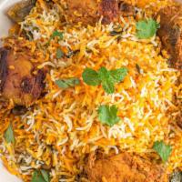 Chicken Dum Biryani · Basmati Rice Cooked In Andhra Style Flavored Chicken.