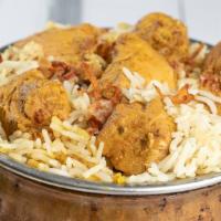 Boneless Chicken Biryani · Basmati Rice And Tender Pieces Of Richly Saffron Flavored Chicken Cooked With Exotic Indian ...