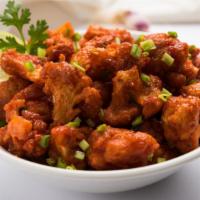 Gobi Manchurian · An Indo-Chinese Fusion Of Battered, Fried Cauliflower Florets Served Dry Or Cooked In Manchu...