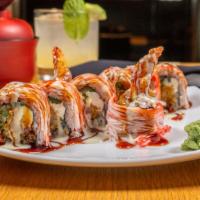 Wasabi Stinger · Tempura shrimp, cream cheese, jalapeño, cucumber; topped with crab mix, wasabi cream sauce, ...
