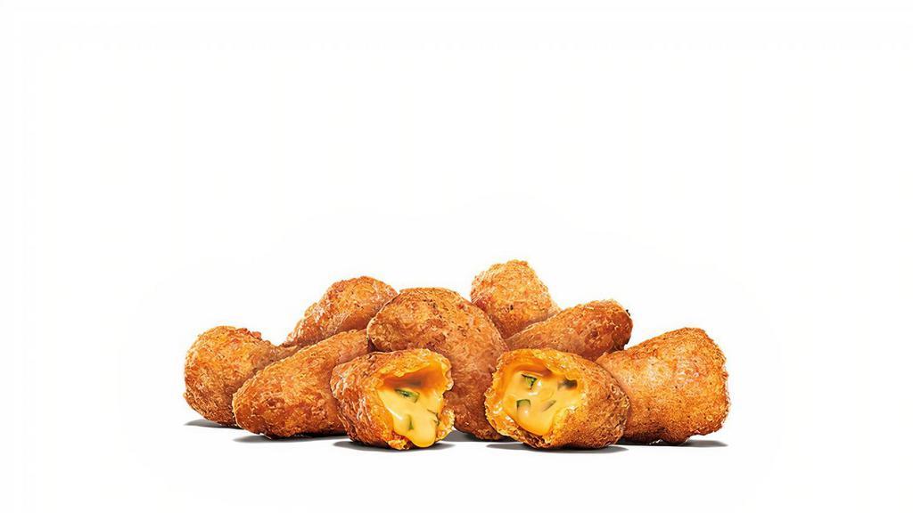 8Pc Jalapeno Cheddar Bites · Light and crispy bites, filled with gooey cheddar cheese and spicy jalapeño pieces.