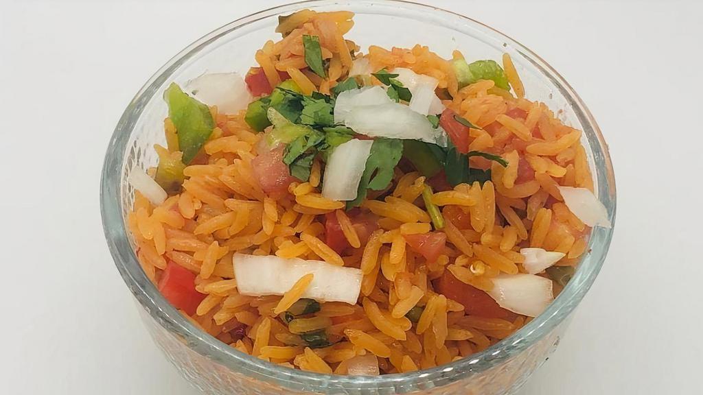Mexican Rice · tomatoes, peppers, onions
