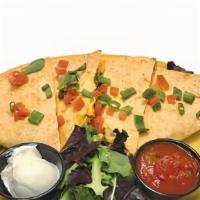 Breakfast Quesadilla · Cheddar and jack cheeses, chorizo sausage, jalapenos and onions blended into fluffy scramble...