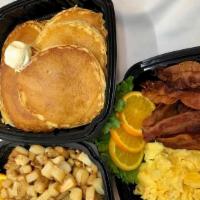 Scram Family Pack · A great family breakfast for 4! Scrambled Eggs, bacon, potato chunks and mini pancakes for t...