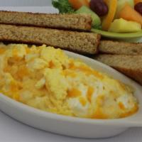 Wisconsin Scrambled · Our freshly cracked eggs scrambled with a blend of monterey jack, cheddar, and cream cheeses...
