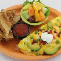Awesome Avocado Omelette · Stuffed with ripe avocado, lean bacon, bell pepper, a blend of monterey jack and cheddar che...