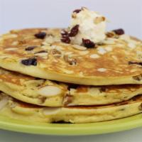 Berry Nutty Cakes · Sliced almonds, dried cranberries and pecans baked into three of our homemade pancakes.
