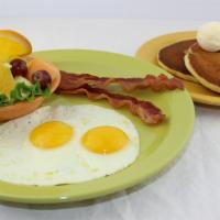 Mini Classic · Two eggs any style, choice of two strips bacon, one pork sausage link or one turkey sausage ...