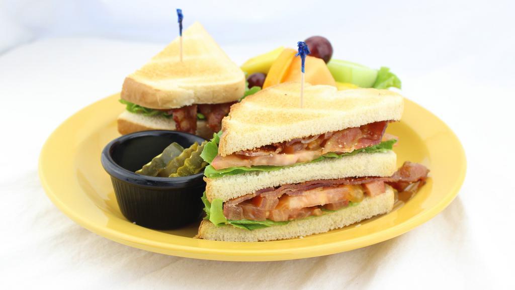 Triple Decker Blt · A traditional favorite, stacked high and served on sourdough toast.