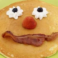 Smiley Face Pancake · One pancake with whipped cream and blueberry 