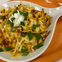 Loaded Hash Browns · Sour cream, cheese and chives.