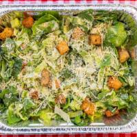 Caesar Salad · Romaine tossed in Caesar dressing, parmesan cheese, chicken, and croutons.