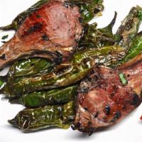 Cordero · Charbroiled lamb chops and blistered padron peppers. Gluten free.