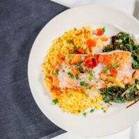 Salmon Con Salsa Vegetables · Grilled salmon, light vegetable sauce, sauteed spinach and pine nuts and Spanish rice. Glute...